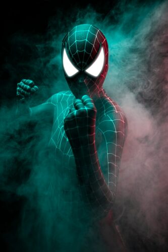 a spider - man in a suit with glowing eyes